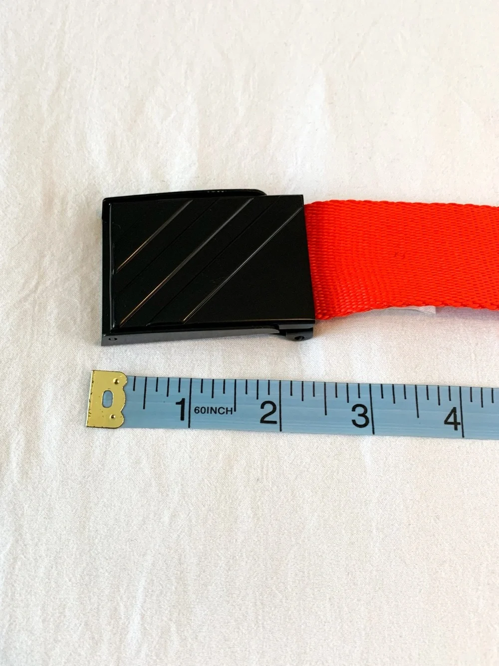 Adidas golf belt red & black with adjustable red nylon strap and flip-top buckle